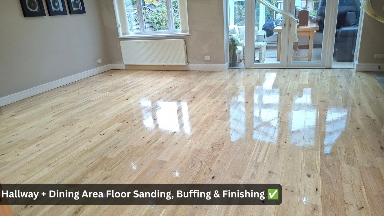 Freshly sanded, buffed and sealed light oak wooden floor in a hallway and dining area, showing a smooth high-gloss finish with natural light reflections