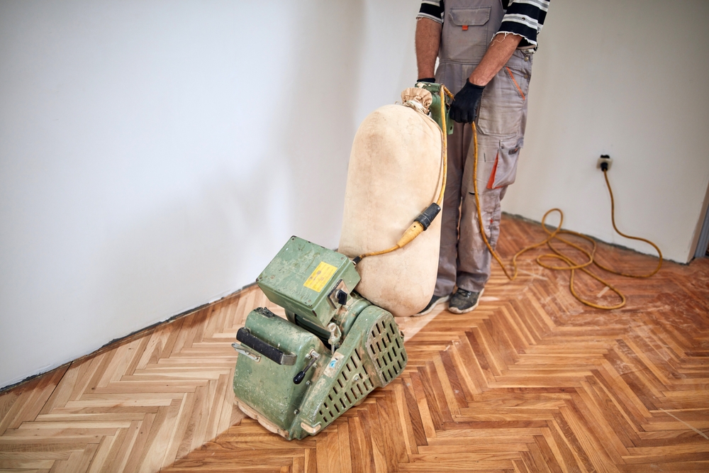 Commercial floor sanding in South West London SW15 using a professional parquet floor sander